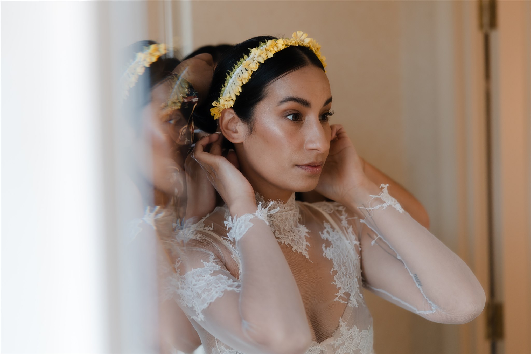 Bride getting ready with traditional hair garland