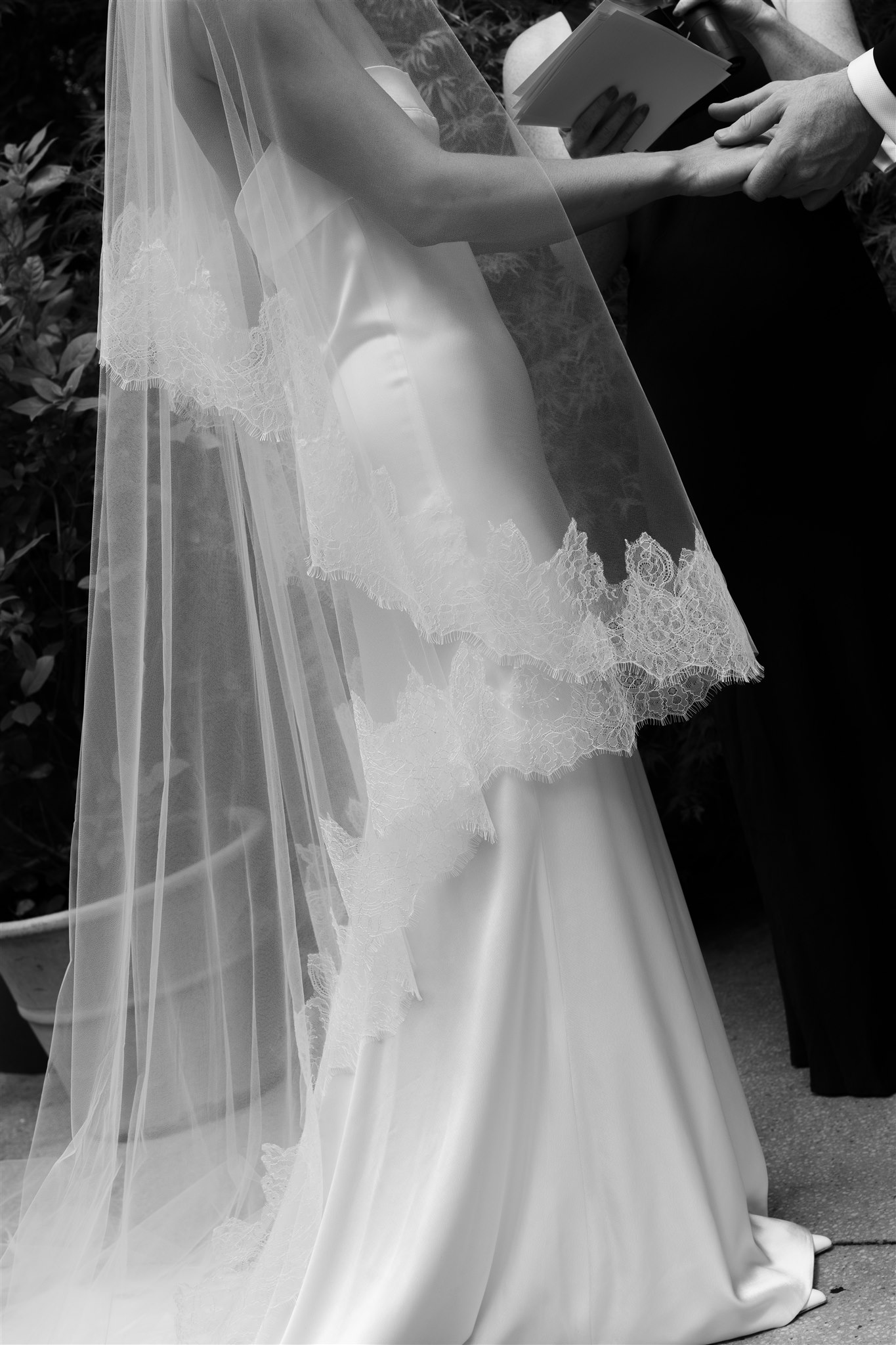 brides beautiful wedding dress and bridal veil by Kyha studios