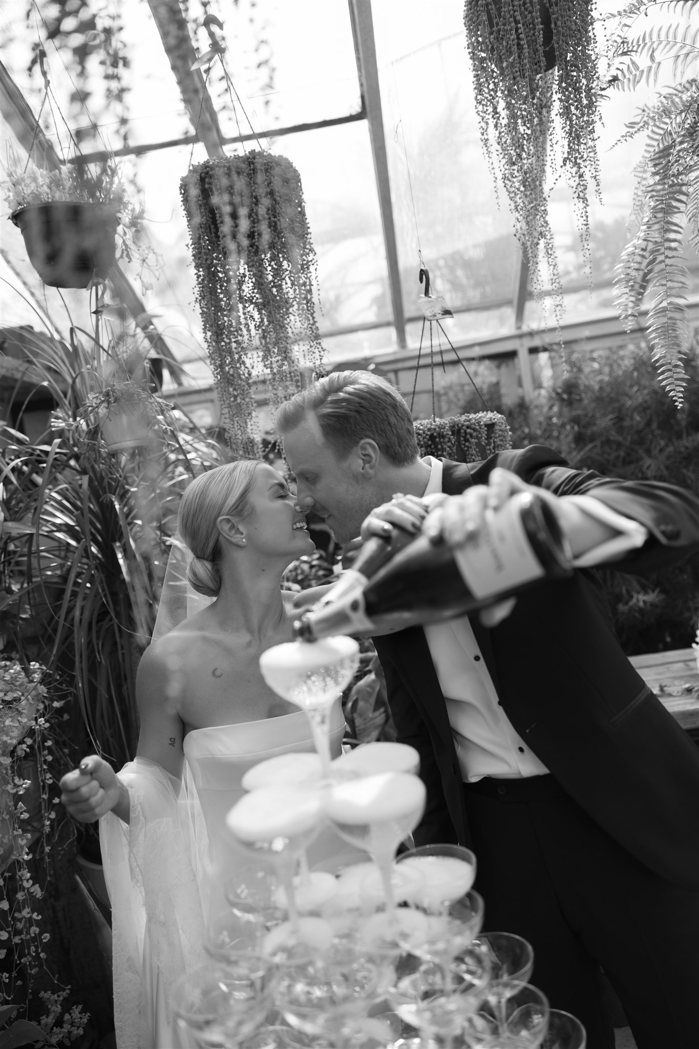 Bride and Groom pouring the champagne tower