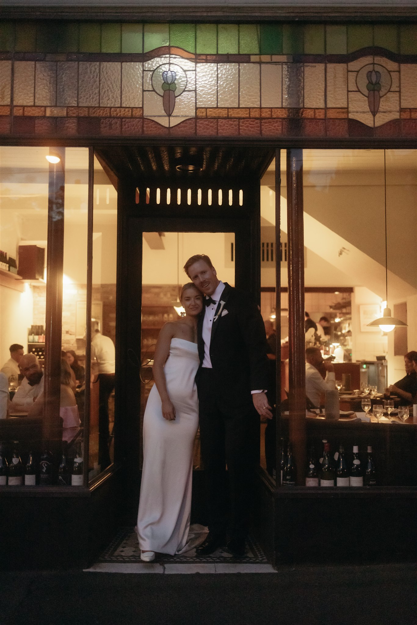 Bridal portraits out the front of their Melbourne wedding venue Clover